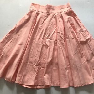Light pink pleated skirt